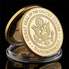 Gold-plated CIA challenge coin featuring the Great Seal of the United States inside a protective case.