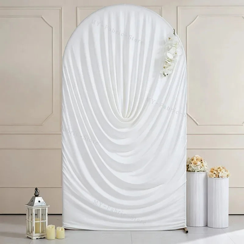 White stretchy spandex arch cover draped elegantly for weddings and events