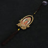 A wooden Our Lady of Guadalupe pendant charm with a gold-colored frame and dark brown cord.