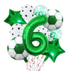 A collection of green and white football-shaped helium foil balloons and a green star balloon for birthday decorations.