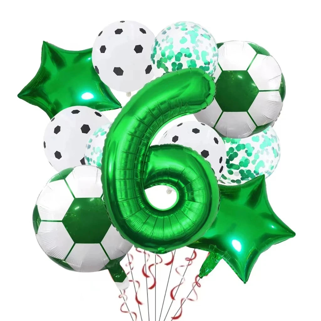 A collection of green and white football-shaped helium foil balloons and a green star balloon for birthday decorations.
