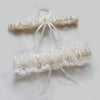 Ivory lace bowknot bridal garter set with sheer ribbons