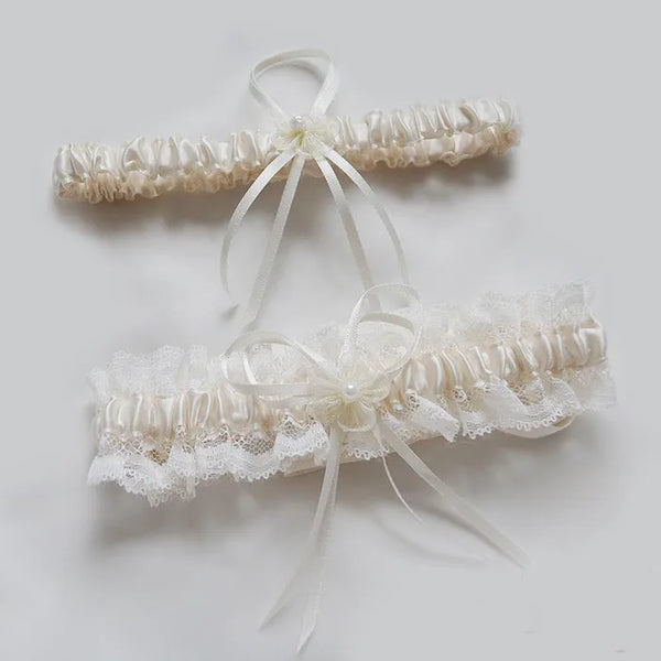 Ivory lace bowknot bridal garter set with sheer ribbons
