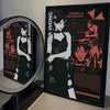 A poster featuring a woman in a black dress and the title Umbrella Corporation and Capcom.