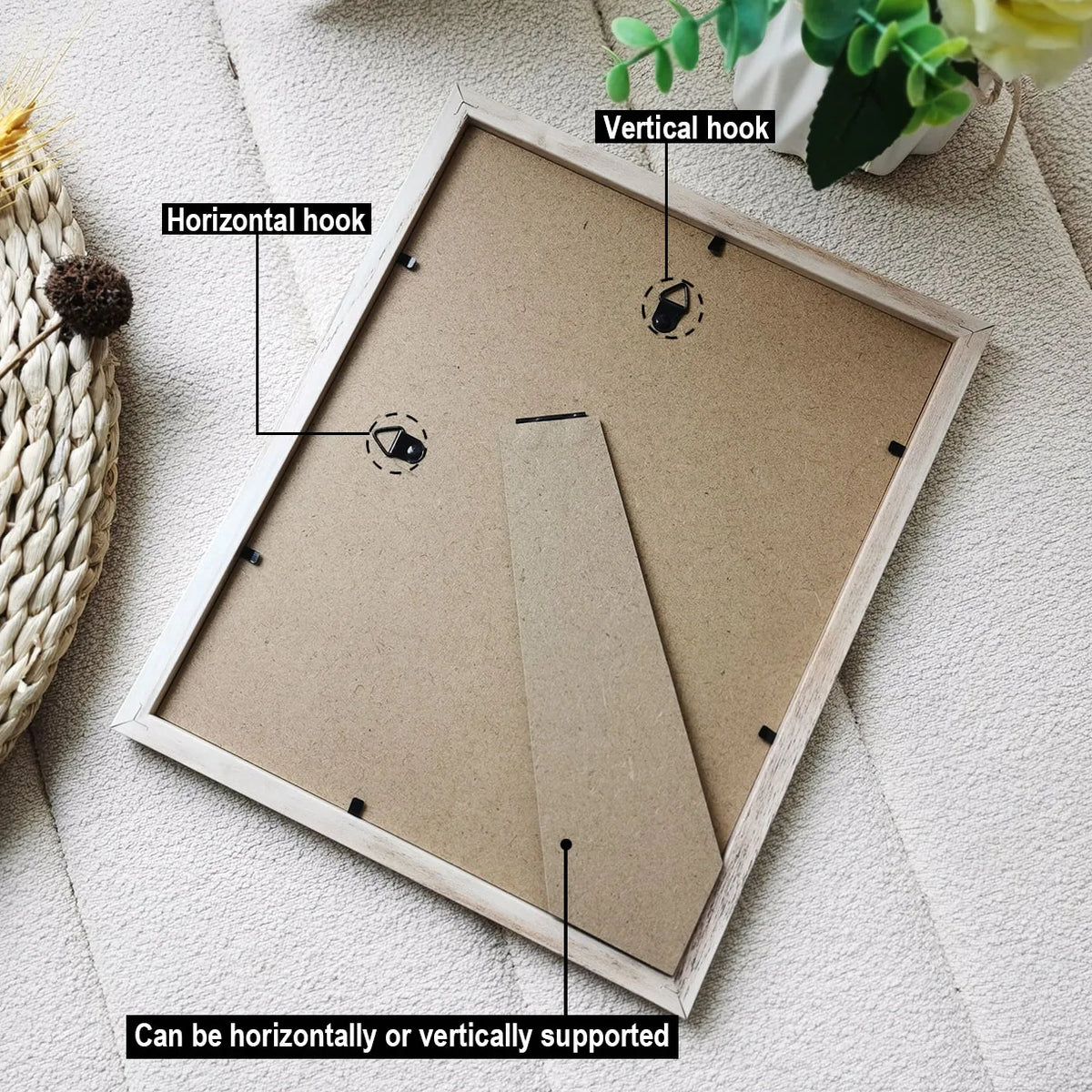 A wooden photo frame with vertical and horizontal hooks is shown on a light surface.