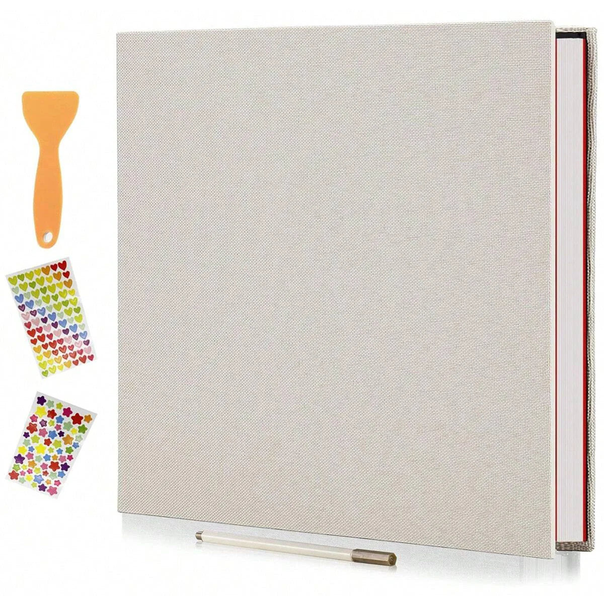 A linen scrapbook photo album with self-adhesive pages shown next to a wooden tool and colorful paper samples.