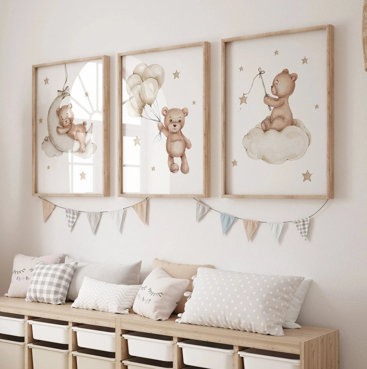 A set of three framed canvas art prints featuring teddy bears and clouds for a nursery wall display.