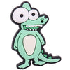 A green cartoon dinosaur charm with large eyes and teeth.