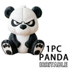 A white and black panda figurine with an angry expression, designed as a car dashboard decor.