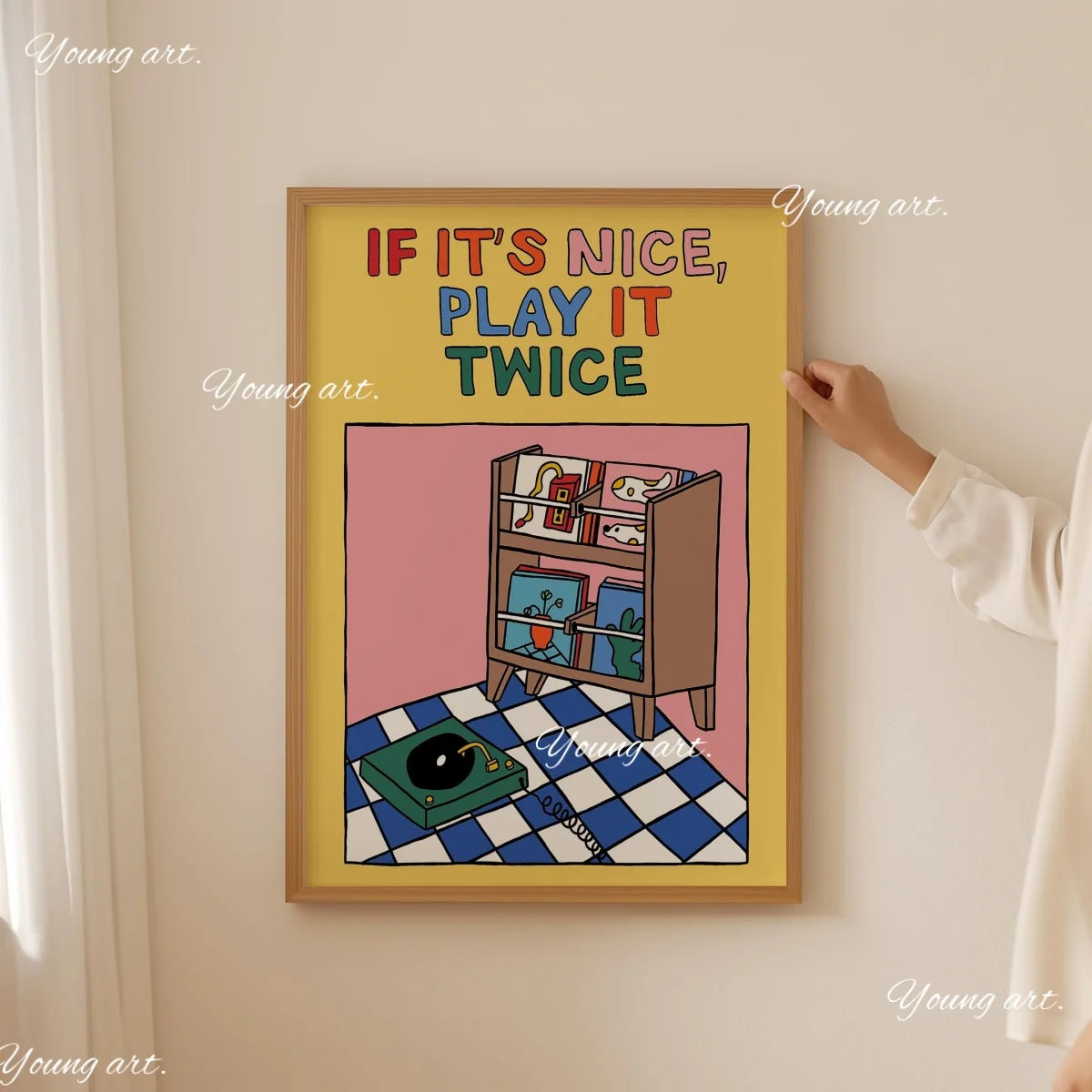 A framed canvas art print with text 'IF IT'S NICE, PLAY IT TWICE' and an illustration of vinyl records.