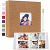 A brown linen scrapbook album with a cover and several color swatches, featuring photo pages.