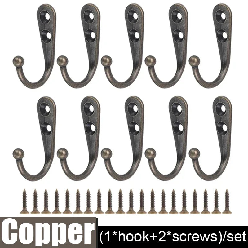 Copper wall-mounted hooks with screws sold as a set for hanging coats and bags