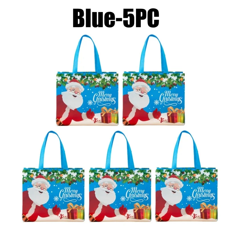 Blue 5-piece set of festive Christmas gift bags with handles featuring Santa faces and green foliage