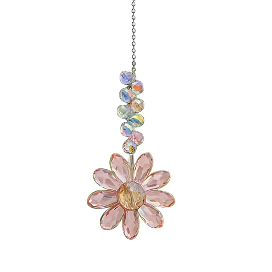 Un diffuseur de soleil en cristal suspendu, fleur de tournesol, avec des cristaux taillés roses et clairs.