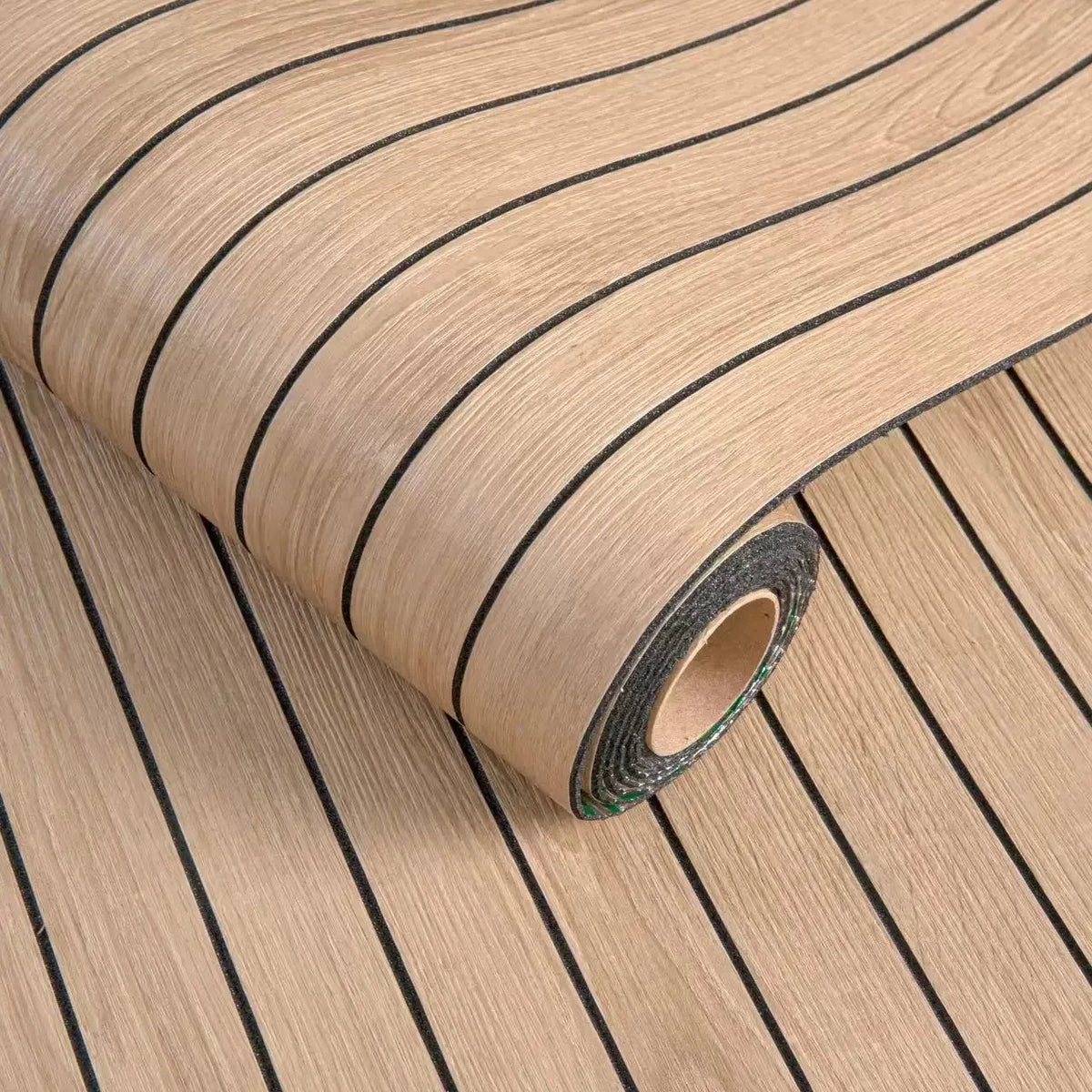 Roll of self-adhesive 3D wood grain wall panels showing parallel lines and a rolled edge.