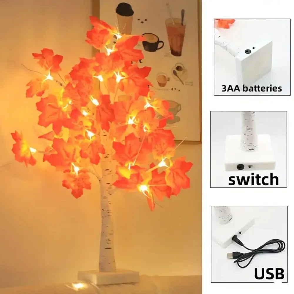 An LED maple leaf table lamp with a warm glow, featuring 3AA batteries, a switch, and USB power.