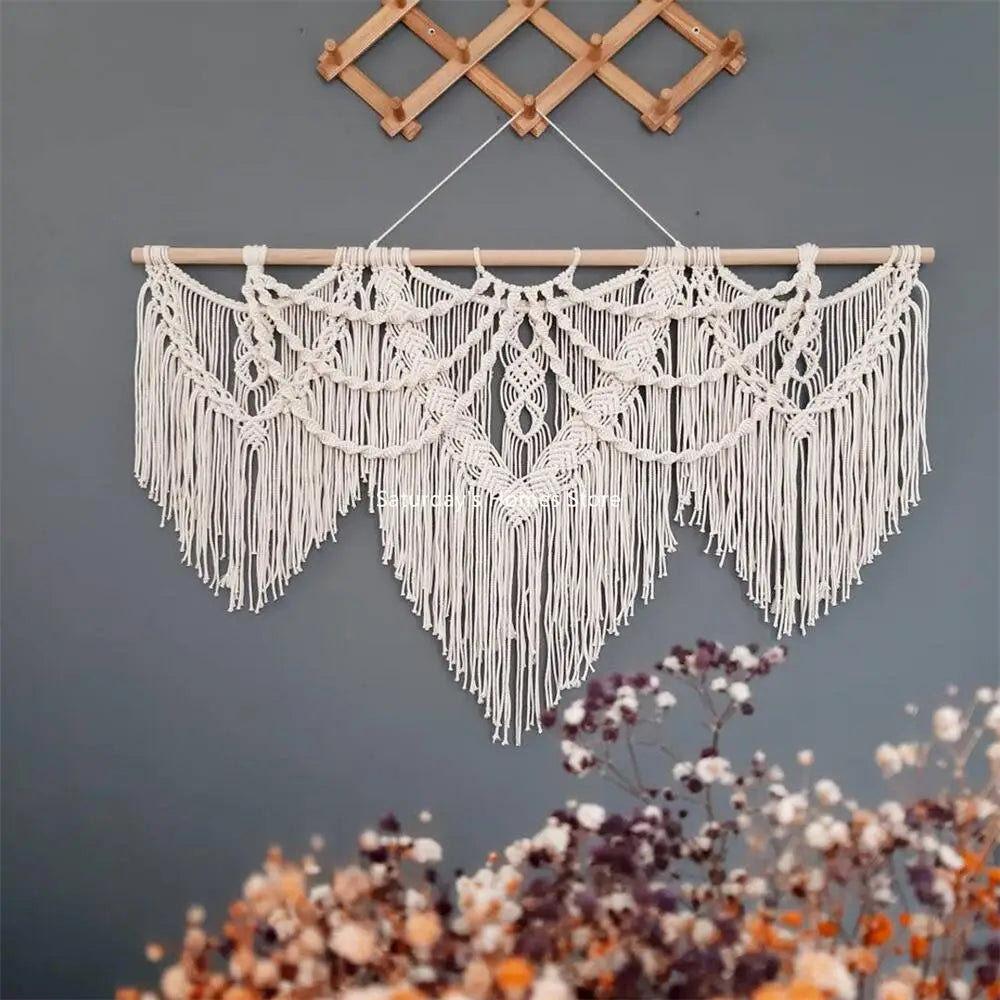 Handwoven boho macrame wall hanging tapestry with white fringe and diamond patterns
