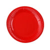 A bright red disposable plate with ruffled edges.