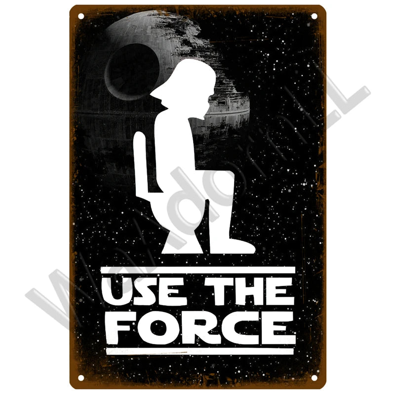 A vintage metal sign featuring a silhouette of a person and a moon against a dark background with the text USE THE FORCE.