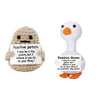 A handmade plush knitting doll shaped like a potato and a goose, featuring positive affirmations.
