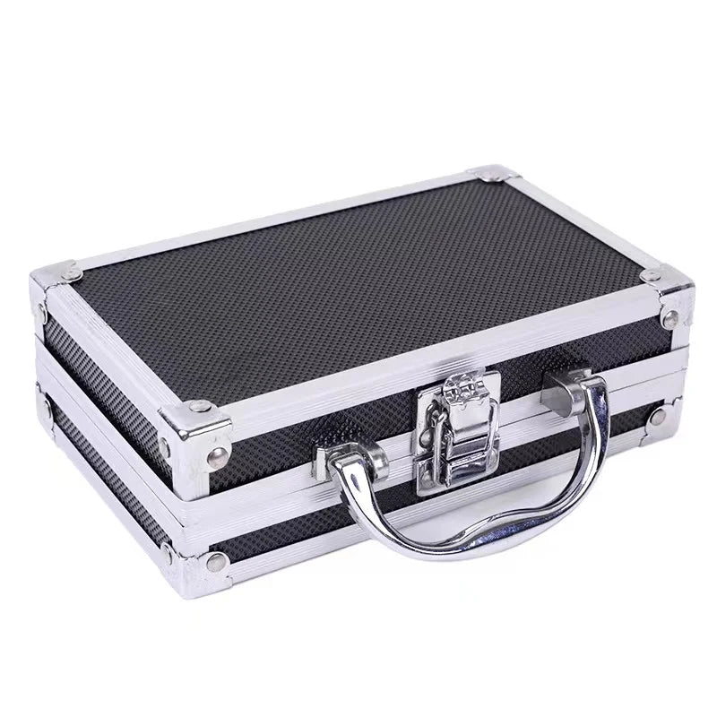 A silver aluminum storage box for a portable tattoo machine with reinforced corners.