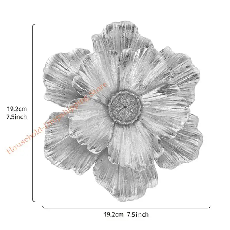 A grayscale image of a layered resin floral wall decor flower with delicate petals.