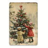 A vintage tin Christmas tree sign depicting a child in a red coat and hat decorating a snowy evergreen tree.