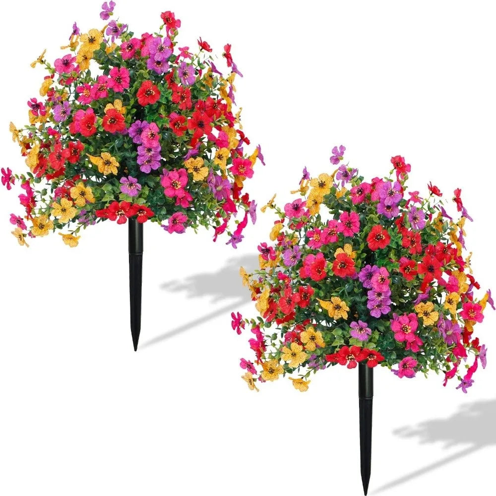A vibrant bouquet of artificial eucalyptus violet flowers in shades of pink, red, yellow, and purple.