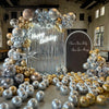 A backdrop decorated with silver and gold chrome metallic latex balloons for a birthday party