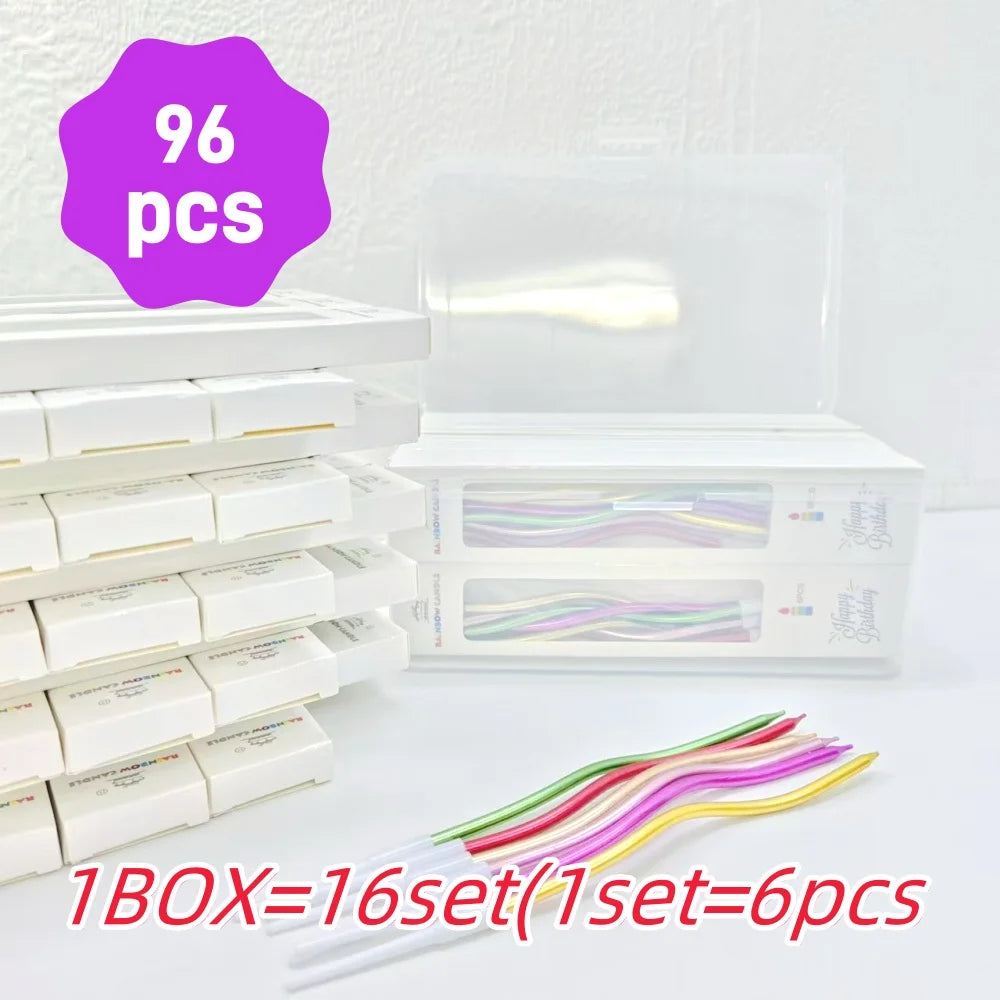 A box of 16 sets of spiral birthday cake candles with star toppers, showing individual sets and loose candles.