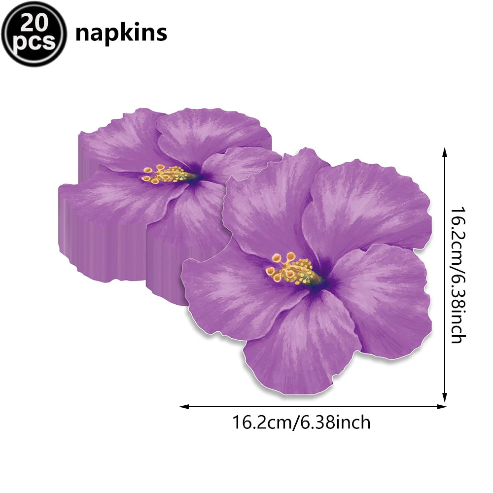 A purple hibiscus flower used as a napkin, part of a Hawaiian luau party set.