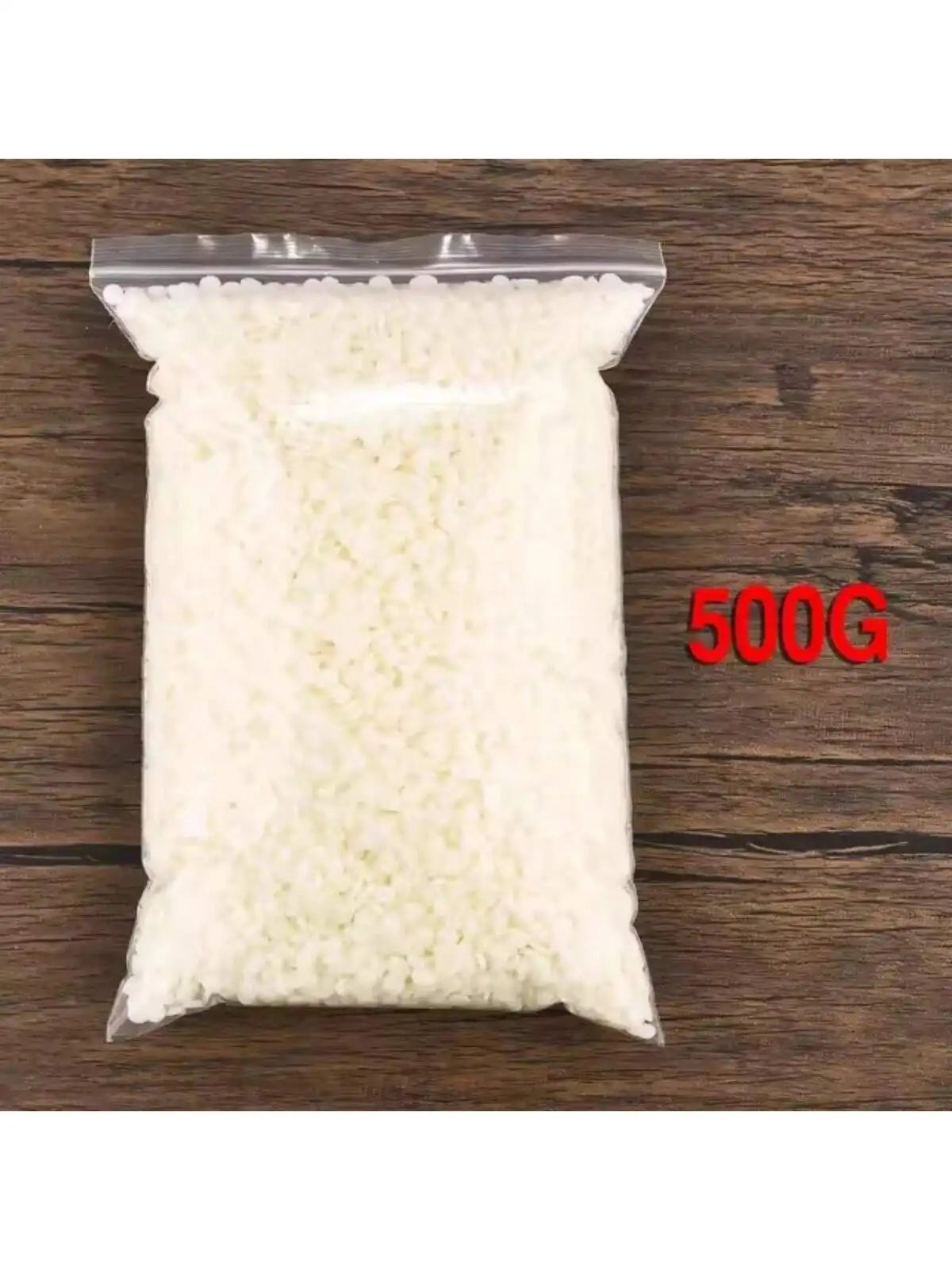 A clear plastic bag filled with white natural soy wax flakes for DIY candle making