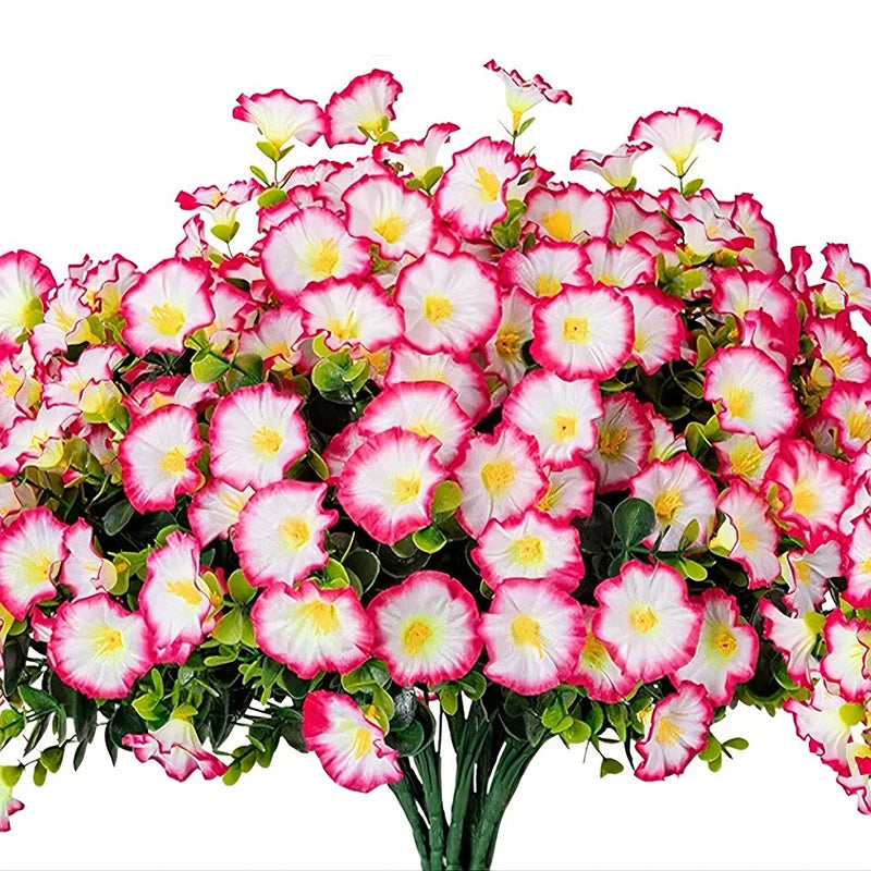 A bouquet of pink and white artificial morning glory flowers with green eucalyptus stems.