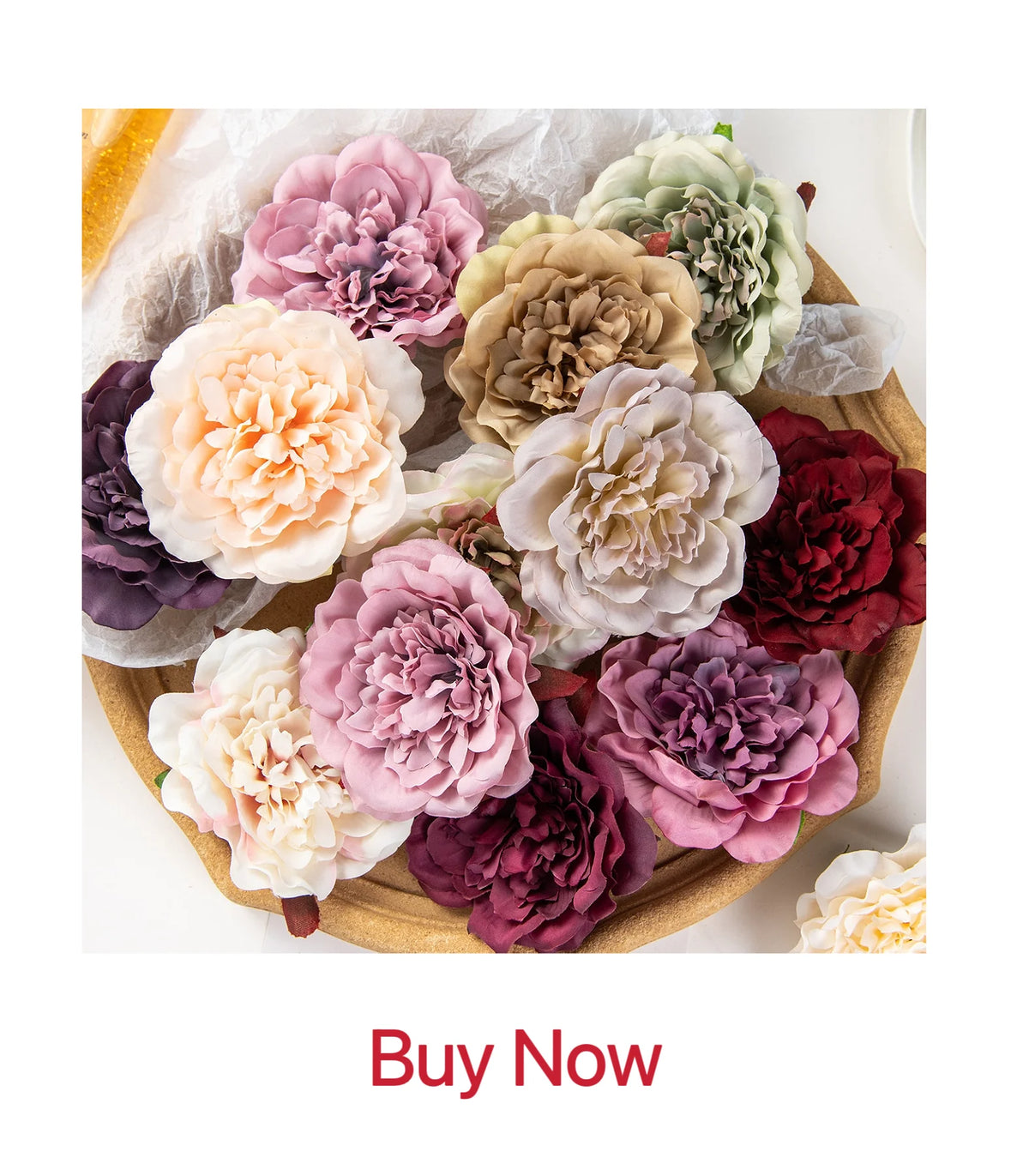 A collection of silk rose vine garlands in various shades of pink, mauve, cream, and green.