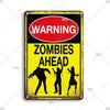 Vintage nuclear fuel storage tin sign with a yellow background and red warning circle featuring the text ZOMBIES AHEAD