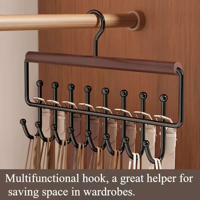 A wall-mounted metal coat rack with a wooden bar and eight hooks designed for storing items in wardrobes.