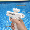A hand holds a white Piank Gun water gun, preparing to launch a stream of water.