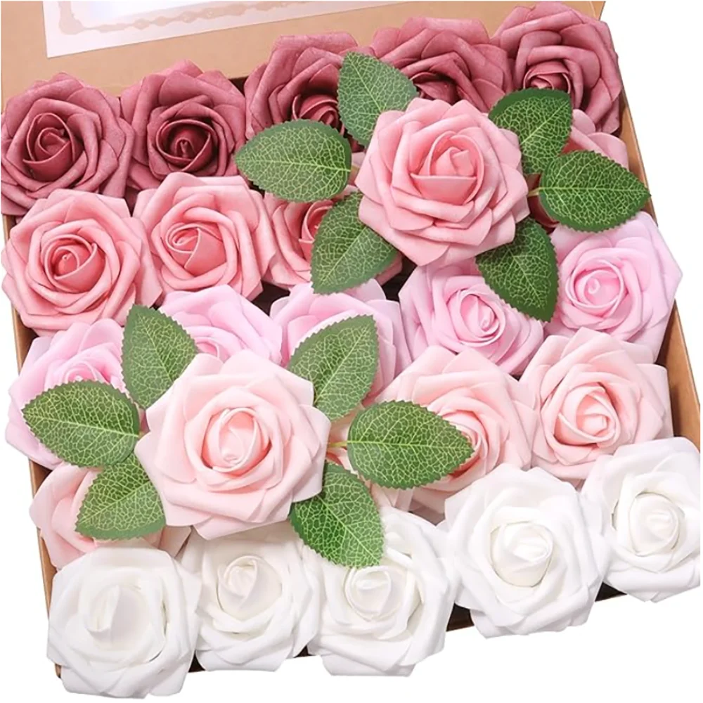 A box filled with artificial foam roses in shades of pink and white for weddings and home decor