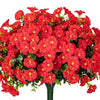 A vibrant bouquet of red artificial morning glory flowers and green eucalyptus stems.