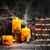 A display of glowing orange LED pillar candles set against a dark background with wispy smoke effects.