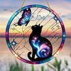 A colorful acrylic hummingbird suncatcher hanging ornament featuring a black cat silhouette against a cosmic background.
