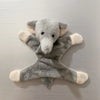 A soft gray elephant plush toy designed as a fridge magnet.