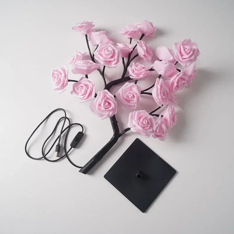 Lampe de table LED noire en forme d'arbre de rose noire avec des roses roses et un fil.