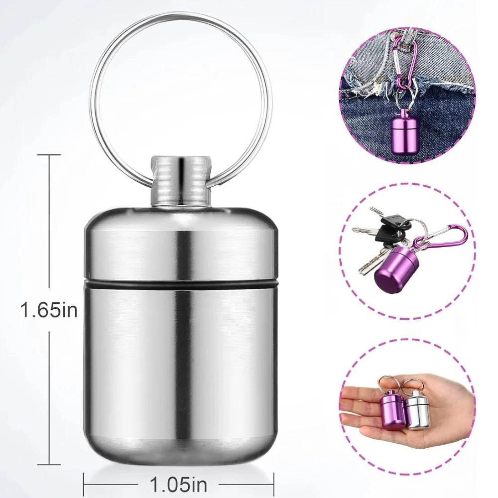 Silver mini waterproof pill organizer keychain with a keyring and a small purple pill container