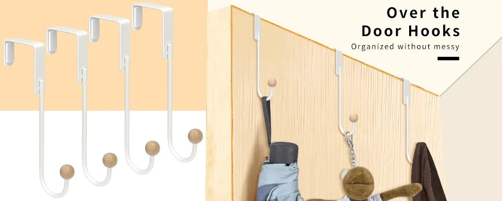 White heavy duty over-the-door hooks organized on a wooden door with various items hanging.