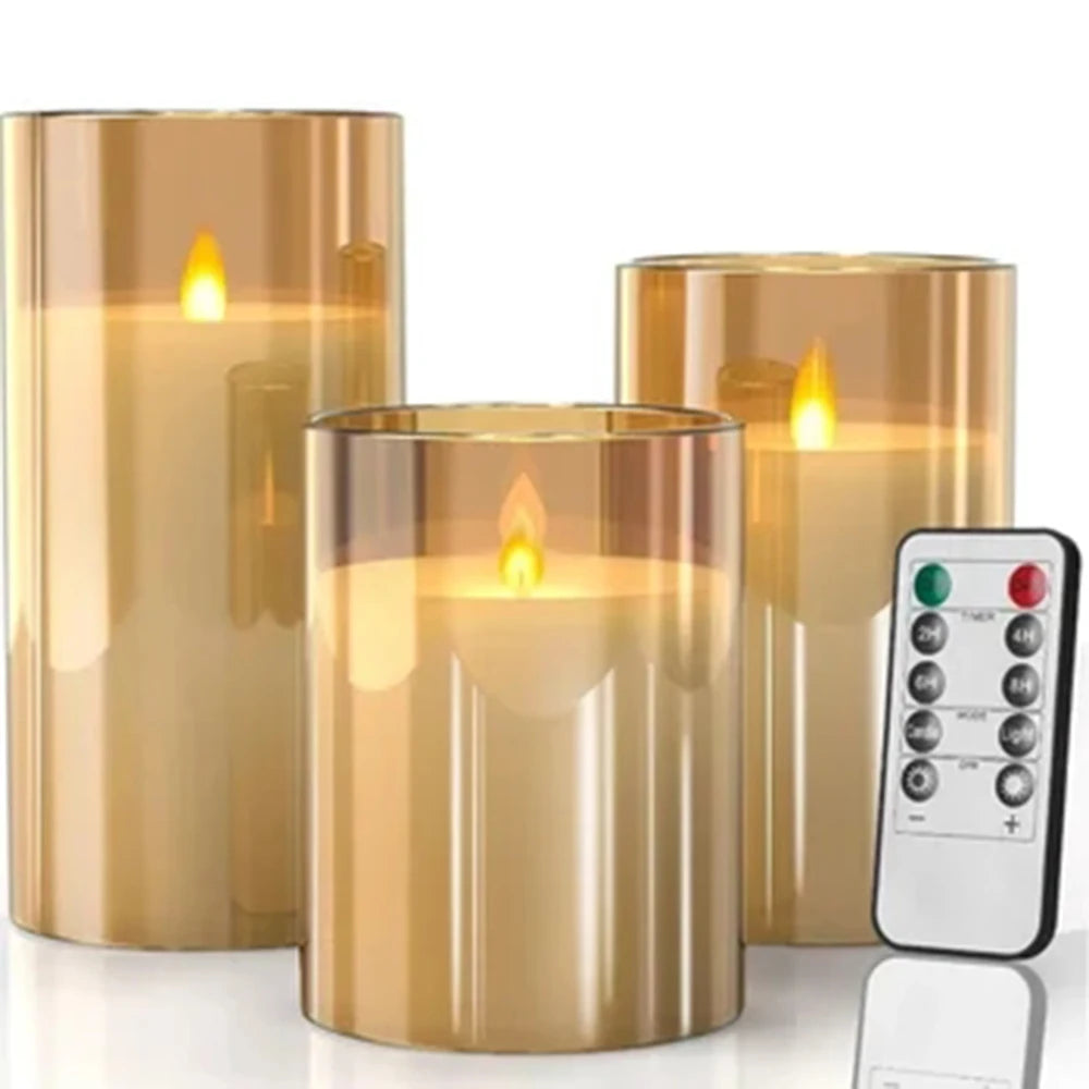 A set of three golden LED flameless candles with flickering flame effects.