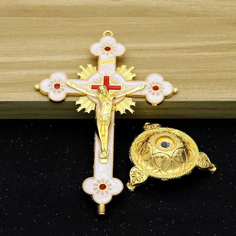Antique-style crucifix figurine featuring a gold cross and corpus mounted on a white stand