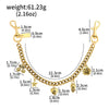Gold chain accessory with charms and measuring tape showing dimensions.