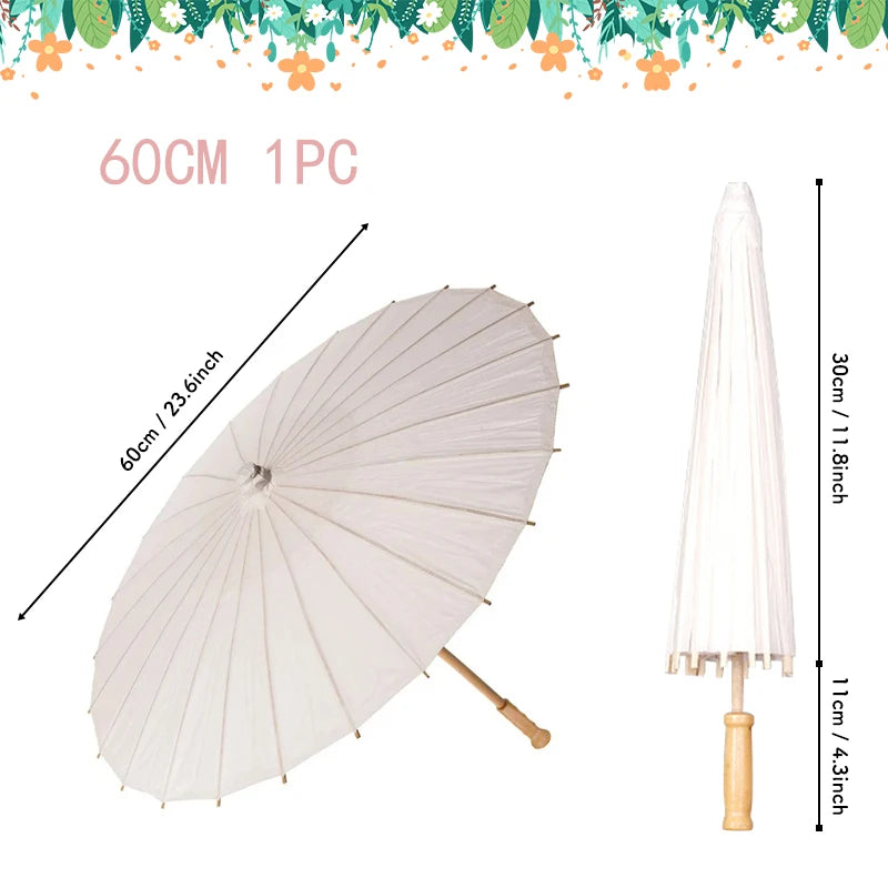 A white oil paper umbrella is shown open and closed, along with a closed version, measuring 60cm wide.