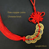 A red silk thread pendant featuring five antique copper coins tied in a Chinese knot.